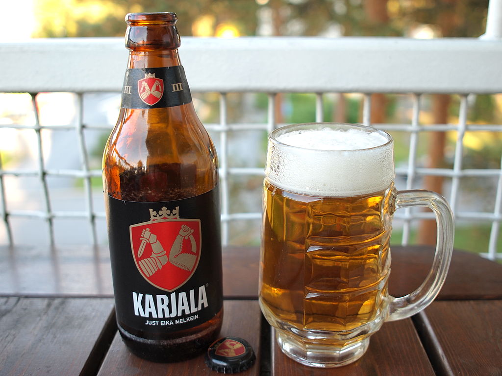 Fig. 7a. Karelia in everyday life in Finland: ‘Karjala’ brand beer, its logo is the coat-of-arms for Finnish North Karelia.  Image: Tommi Nummelin / Wikimedia Commons